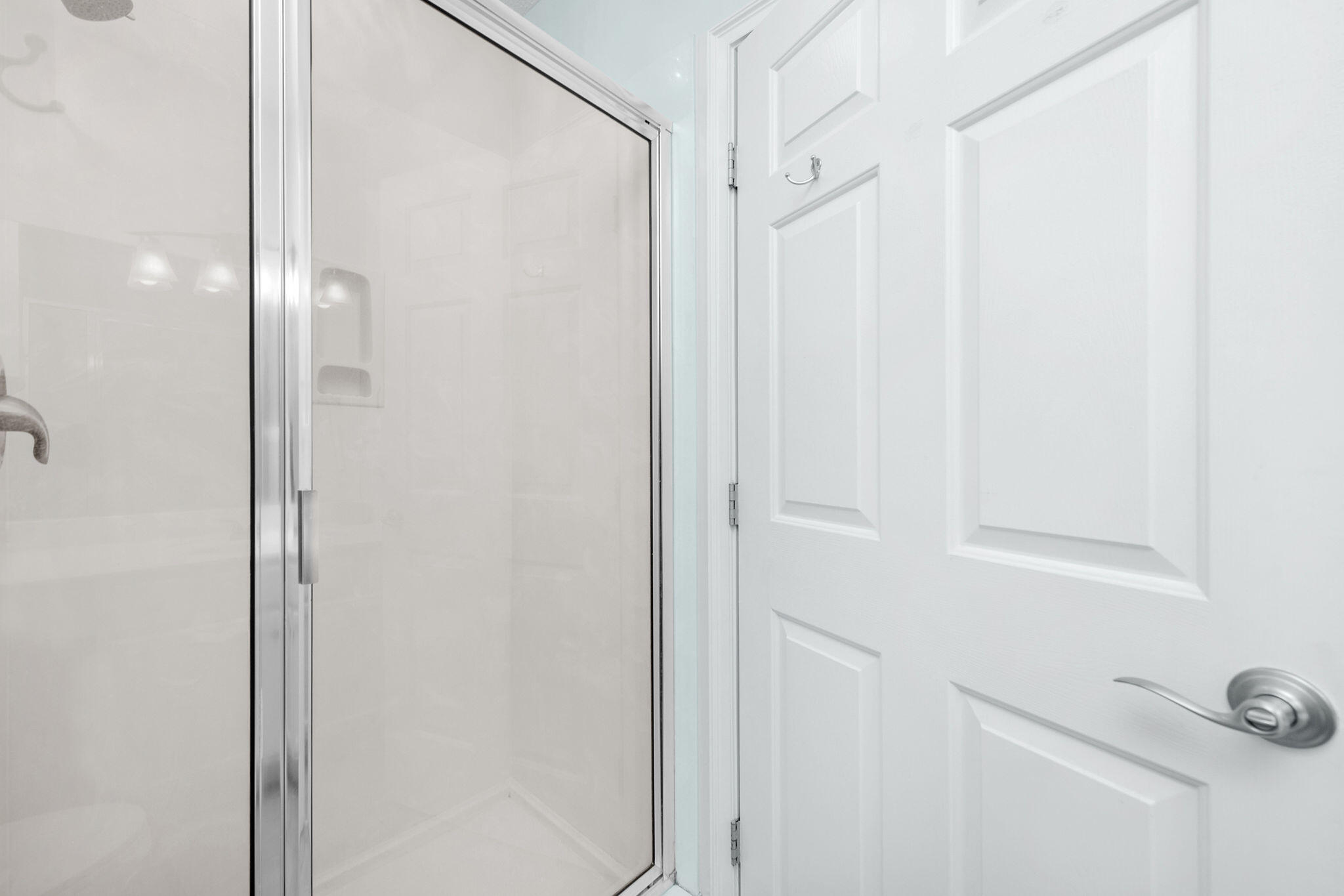 590 Santa Rosa Boulevard, Unit 613 Fort Walton Beach, FL 32548 - Photo 9 of 33 a bathroom with a shower and a glass door