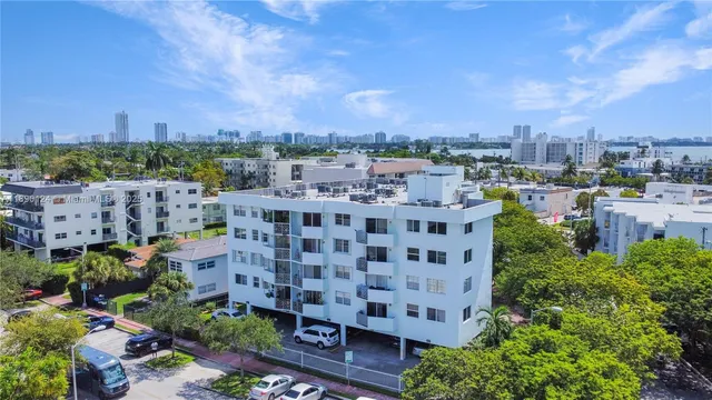 a view of city with tall buildings