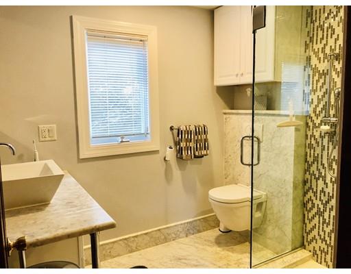22 Azalea Road Sharon, MA 02067 - Photo 11 of 27 a bathroom with a toilet sink and shower
