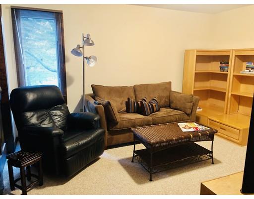 22 Azalea Road Sharon, MA 02067 - Photo 12 of 27 a living room with furniture and a window