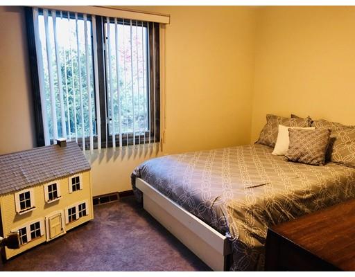 22 Azalea Road Sharon, MA 02067 - Photo 13 of 27 a bedroom with a bed and a window