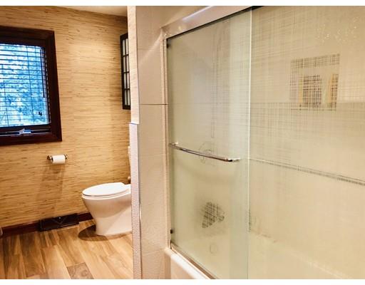 22 Azalea Road Sharon, MA 02067 - Photo 14 of 27 a bathroom with a toilet and a shower