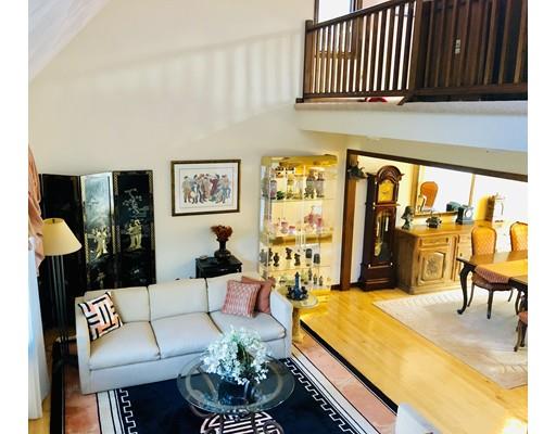 22 Azalea Road Sharon, MA 02067 - Photo 3 of 27 a living room with furniture and a floor to ceiling window