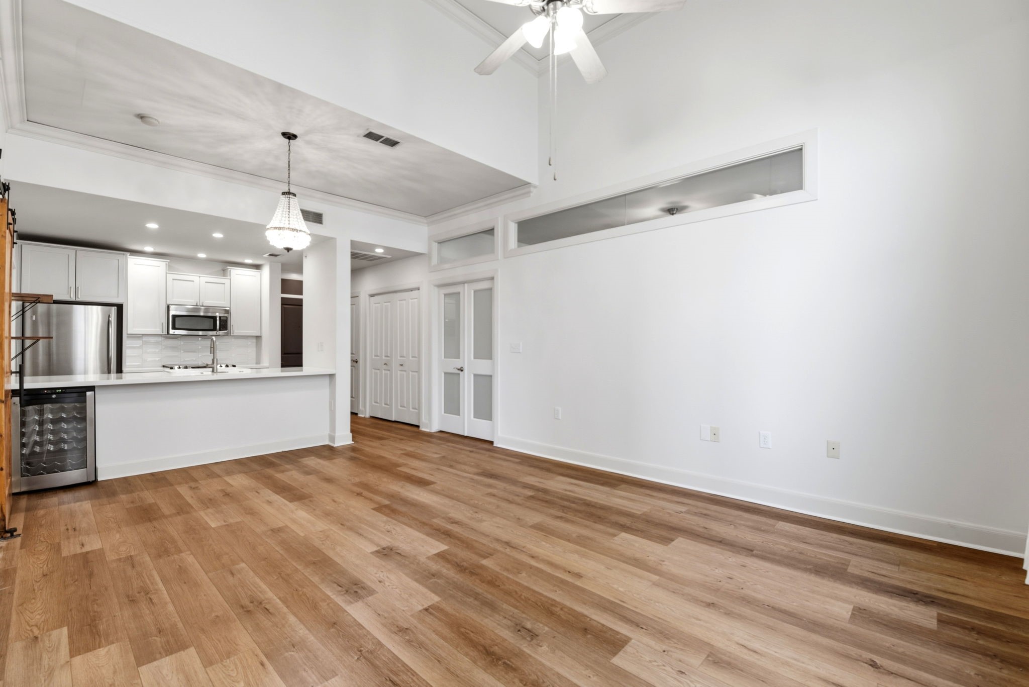 1010 Rosine Street, Unit 43 Houston, TX 77019 - Photo 27 of 48 a view of a kitchen with a sink and a refrigerator