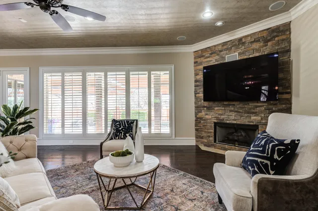 a view of hallway with wooden floor