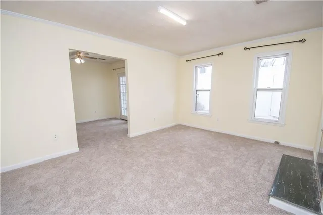 a kitchen with stainless steel appliances granite countertop a stove and a refrigerator