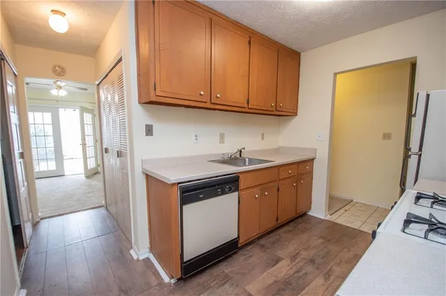 a bathroom with a toilet and a bath tub
