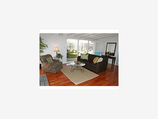 2416 Laura Lane Mountain View, CA 94043 - Photo 2 of 9 a living room with furniture and a large window