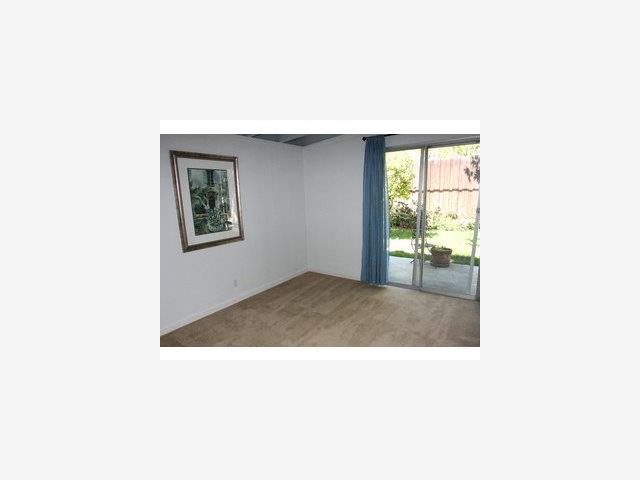 2416 Laura Lane Mountain View, CA 94043 - Photo 7 of 9 a en suite bathroom with a sink and a mirror