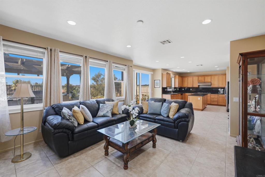 2784 Rambling Vista Road Chula Vista, CA 91915 - Photo 16 of 42 a living room with furniture and a large window