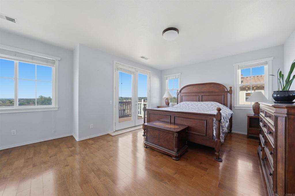 2784 Rambling Vista Road Chula Vista, CA 91915 - Photo 20 of 42 a bedroom with a bed furniture and a window