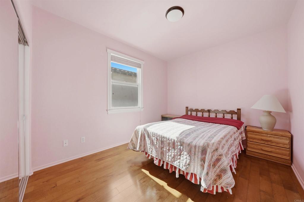 2784 Rambling Vista Road Chula Vista, CA 91915 - Photo 23 of 42 a bedroom with a bed and a table