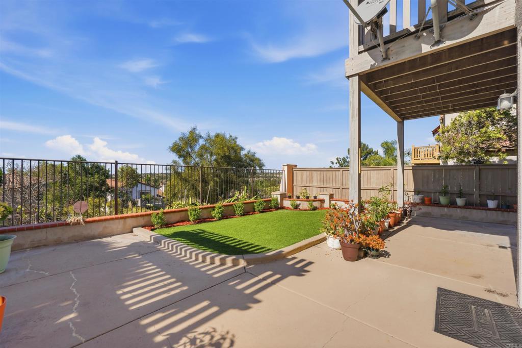 2784 Rambling Vista Road Chula Vista, CA 91915 - Photo 30 of 42 a view of a patio with a table chairs and a fire pit