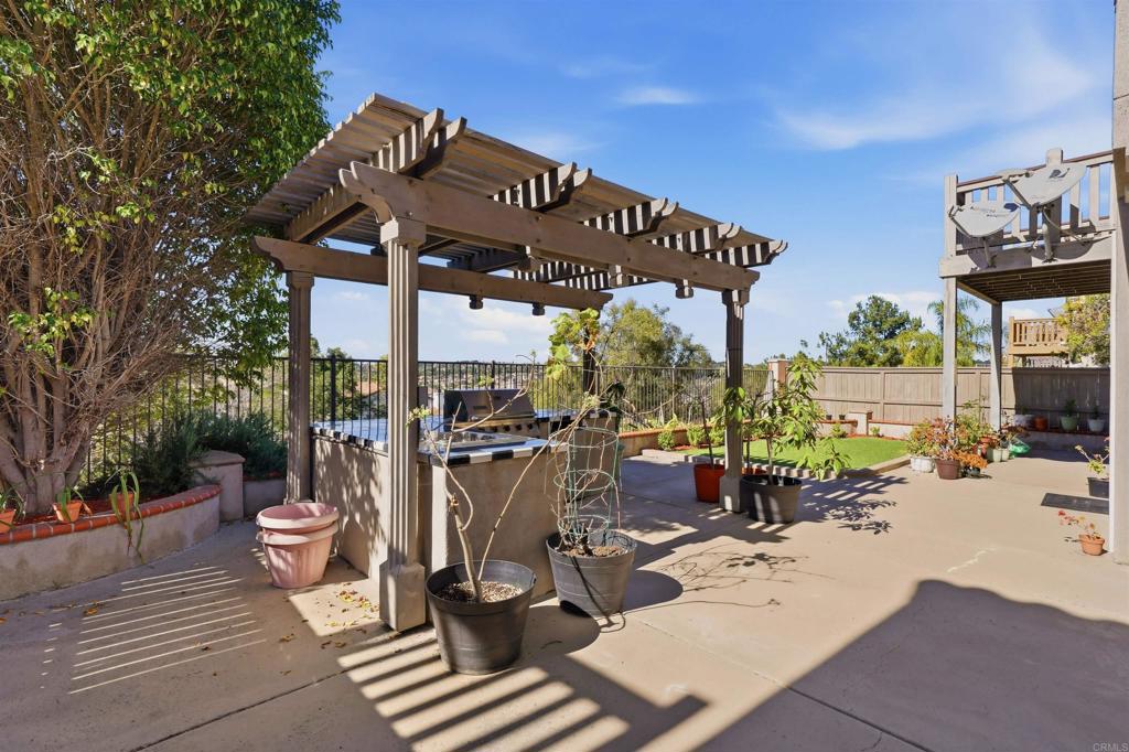 2784 Rambling Vista Road Chula Vista, CA 91915 - Photo 31 of 42 a view of a chairs and tables in patio