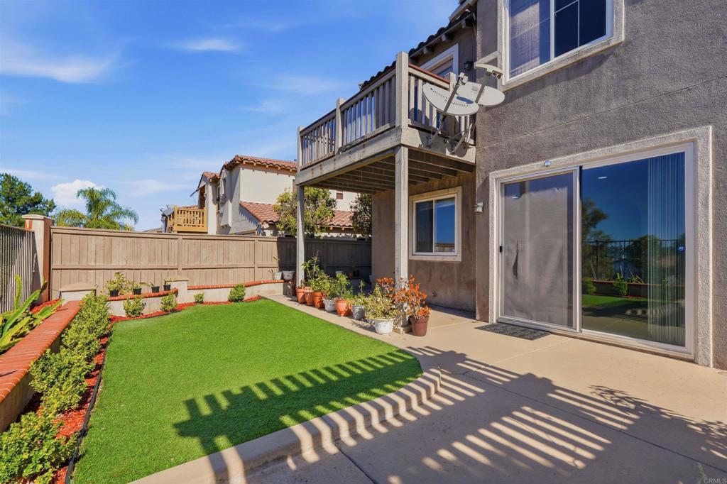 2784 Rambling Vista Road Chula Vista, CA 91915 - Photo 32 of 42 a view of a house with backyard porch and sitting area
