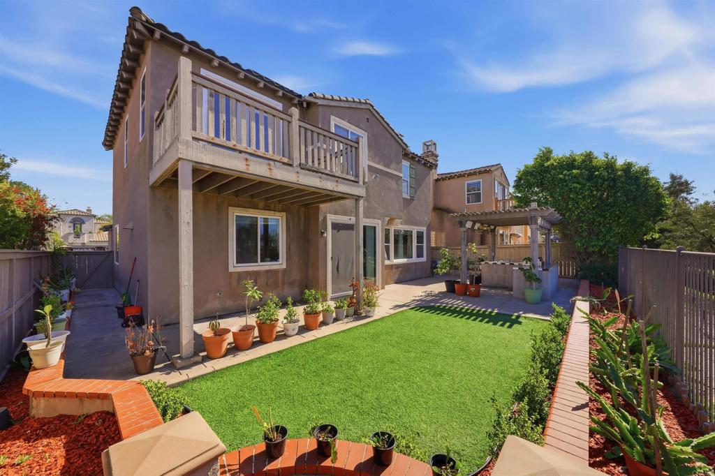 2784 Rambling Vista Road Chula Vista, CA 91915 - Photo 5 of 42 a front view of a house with garden