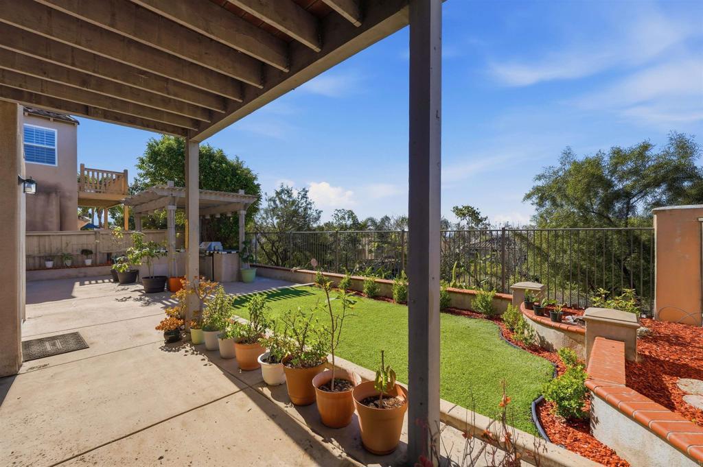 2784 Rambling Vista Road Chula Vista, CA 91915 - Photo 6 of 42 a view of a chair and tables in the patio
