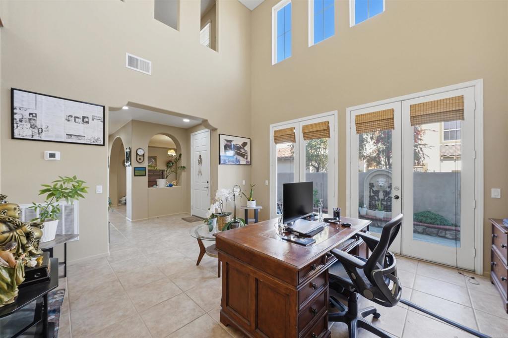 2784 Rambling Vista Road Chula Vista, CA 91915 - Photo 7 of 42 a view of a dining room with furniture and chandelier
