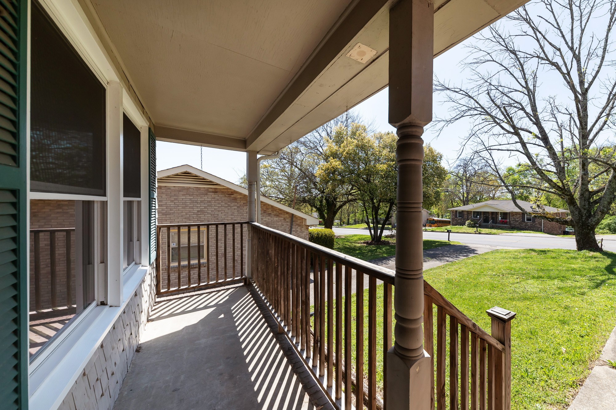 2906 Anderson Road Nashville, TN 37217 - Photo 3 of 35 a view of a porch with wooden floor and fence
