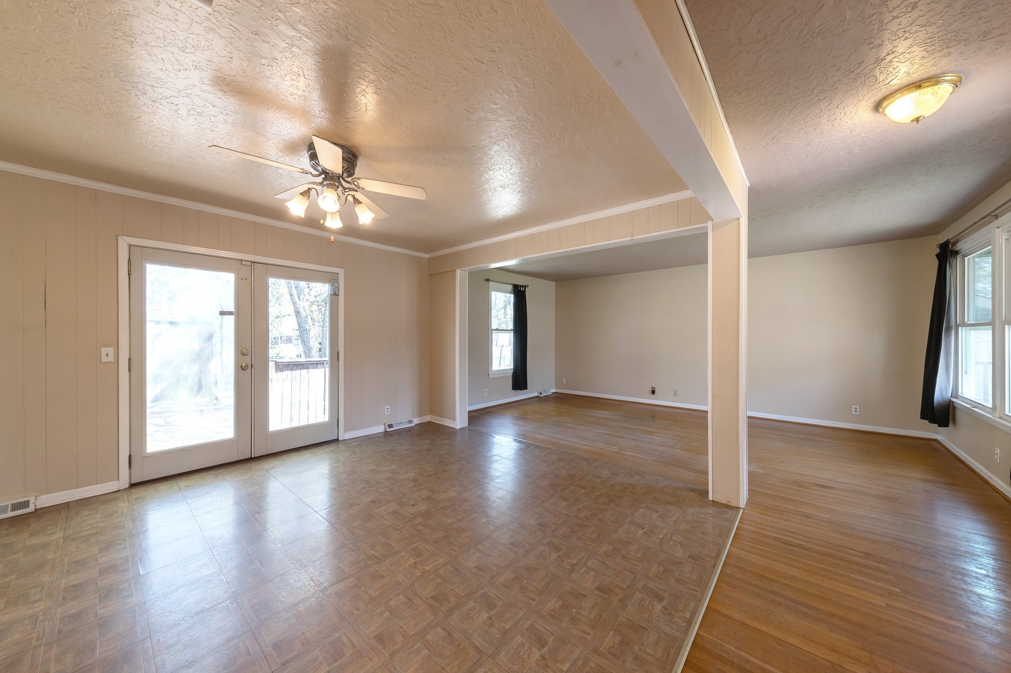 2906 Anderson Road Nashville, TN 37217 - Photo 5 of 35 a view of an empty room with window and wooden floor