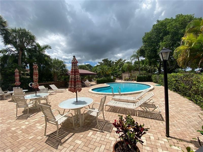 7448 La Paz Boulevard, Unit 104 Boca Raton, FL 33433 - Photo 16 of 16 7448 La Paz Satellite Pool
