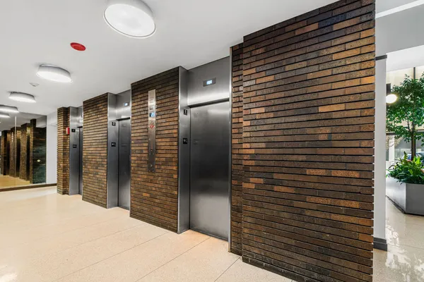 a bathroom with a shower and a sink