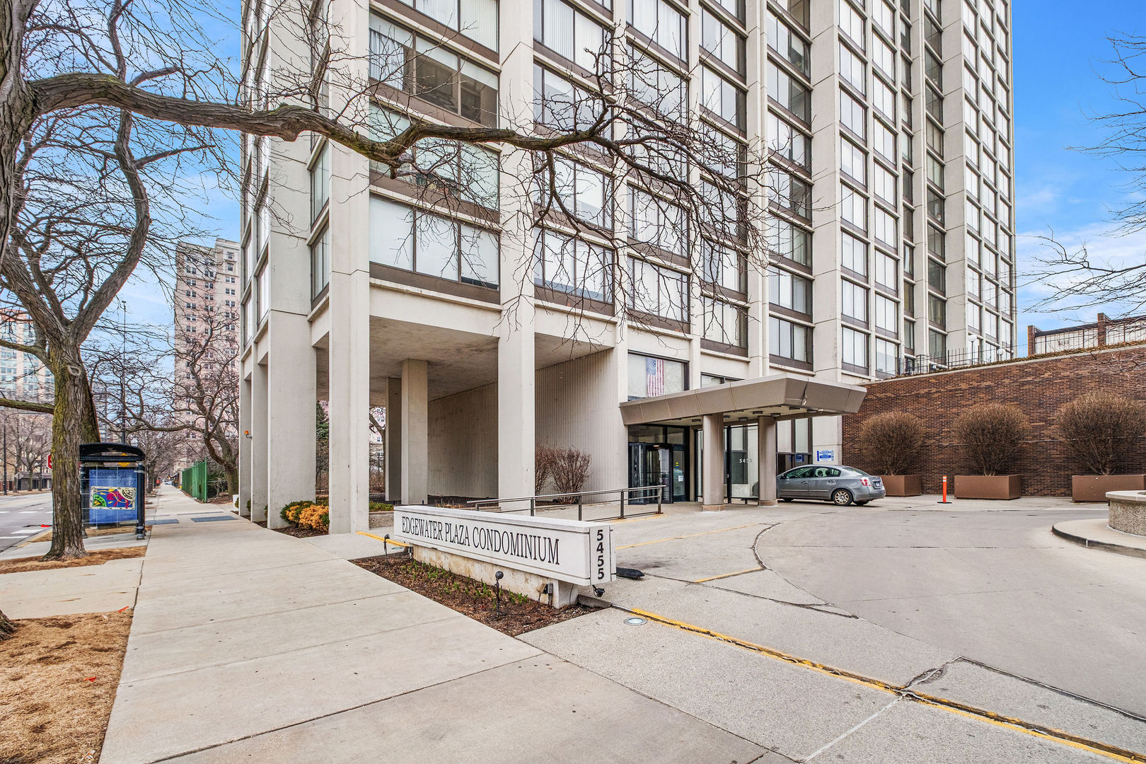 5455 North Sheridan Road, Unit 509 Chicago, IL 60640 - Photo 19 of 19 front view of a building with a street