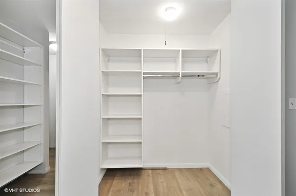 a view of an empty walk in closet