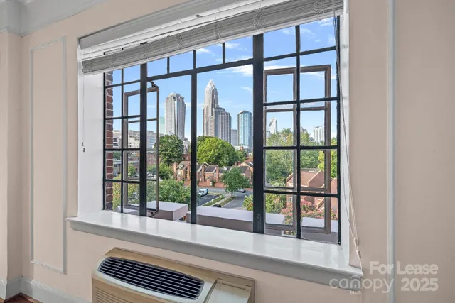 a view of a room and window