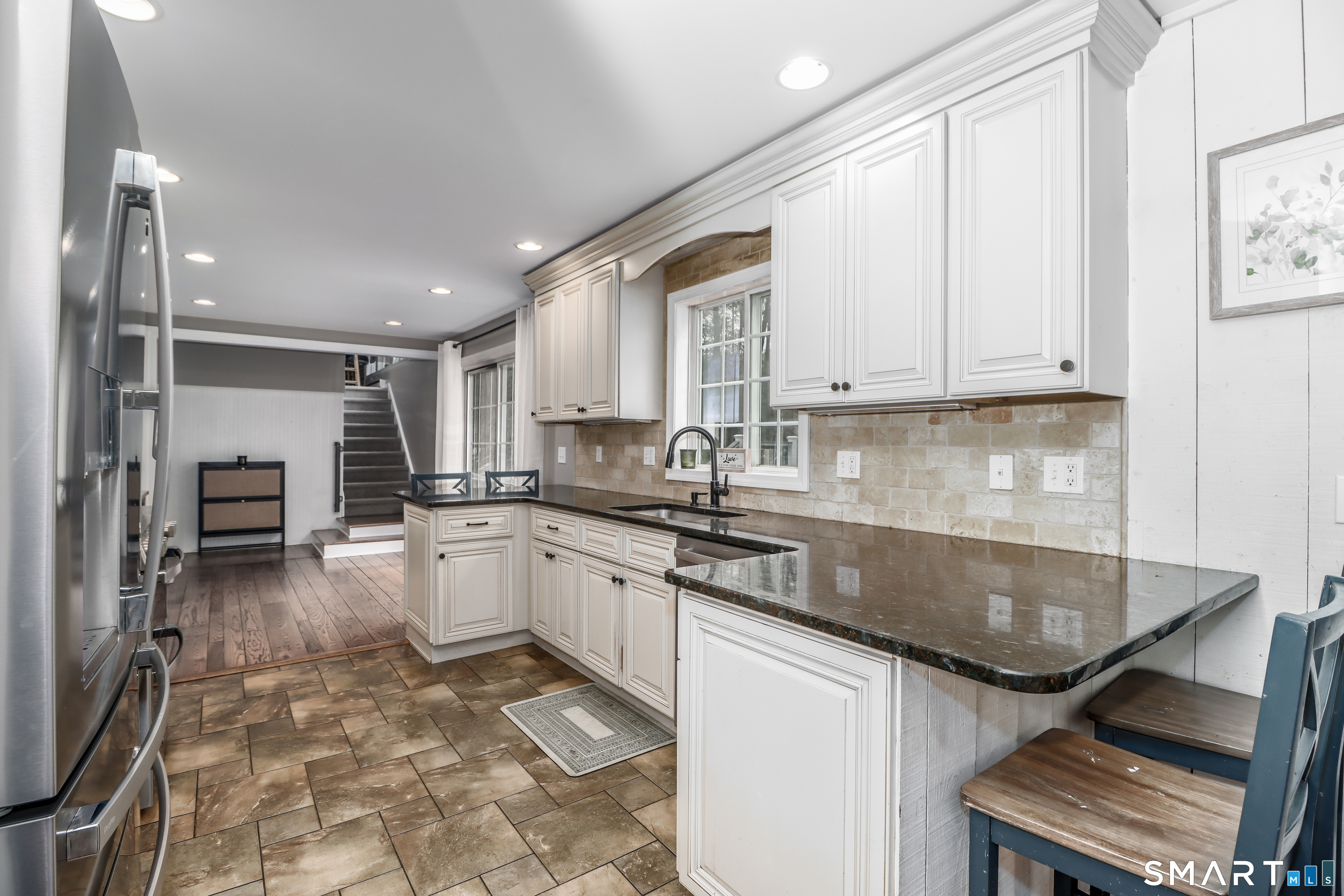 20 Puritan Valley Road Brookfield, CT 06804 - Photo 8 of 35 a kitchen with a sink appliances and cabinets