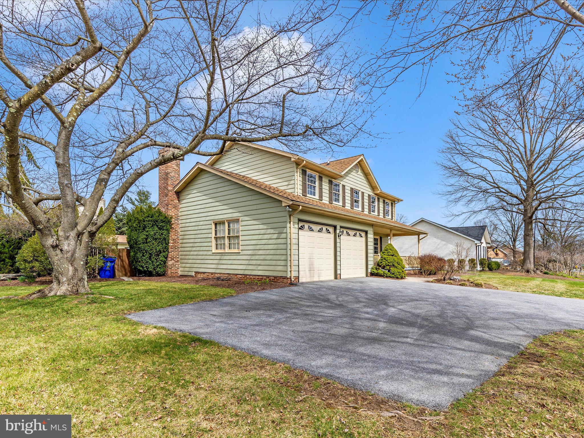 7094 Autumn Leaf Lane Frederick, MD 21702 - Photo 34 of 43 a front view of house with yard and trees around