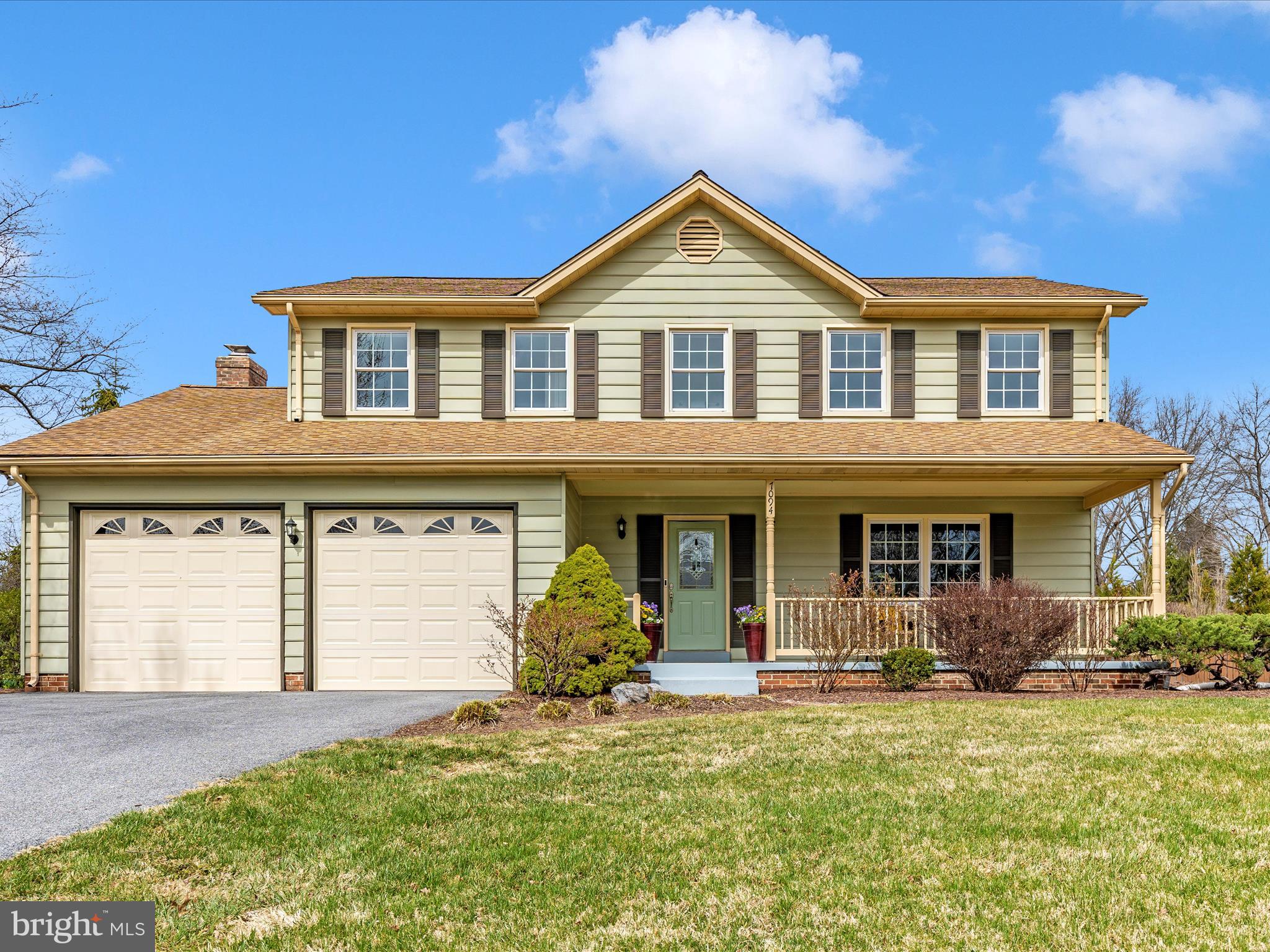 7094 Autumn Leaf Lane Frederick, MD 21702 - Photo 35 of 43 a front view of a house with garden