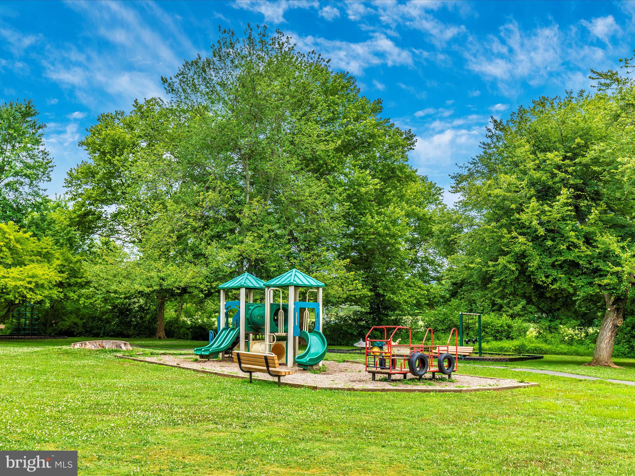 7094 Autumn Leaf Lane Frederick, MD 21702 - Photo 38 of 43 a view of a swimming pool with lawn chairs and a big yard