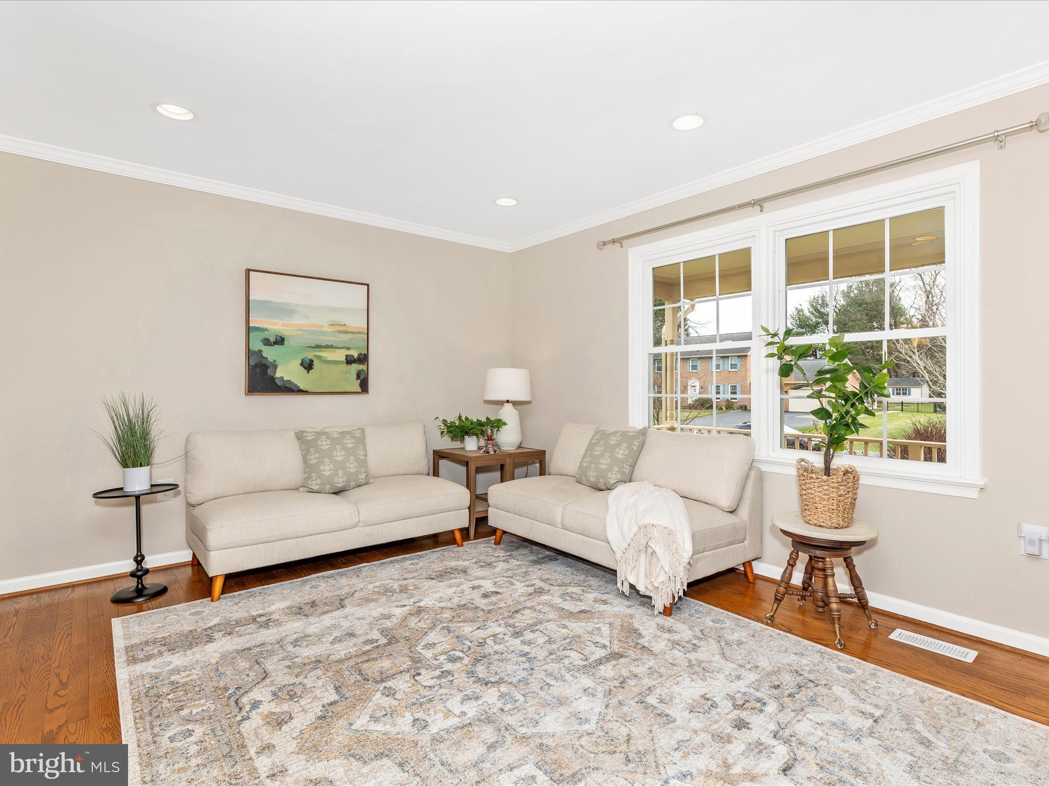 7094 Autumn Leaf Lane Frederick, MD 21702 - Photo 4 of 43 a living room with furniture and a large window