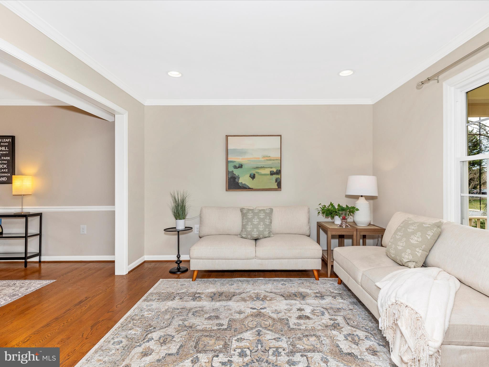 7094 Autumn Leaf Lane Frederick, MD 21702 - Photo 5 of 43 a living room with furniture and a rug