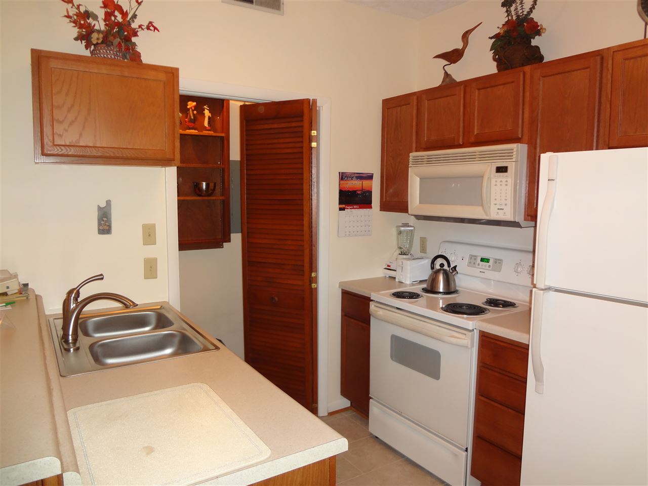 478 Three Ridges Roseland, VA 22967 - Photo 6 of 9 a kitchen with stainless steel appliances a stove a microwave a sink and cabinets