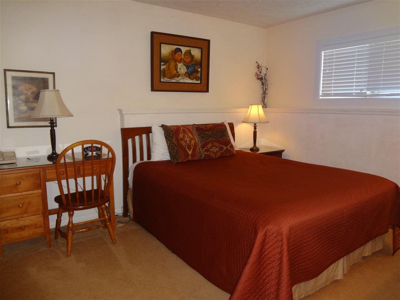 478 Three Ridges Roseland, VA 22967 - Photo 7 of 9 a bed sitting in a bedroom next to a lamp