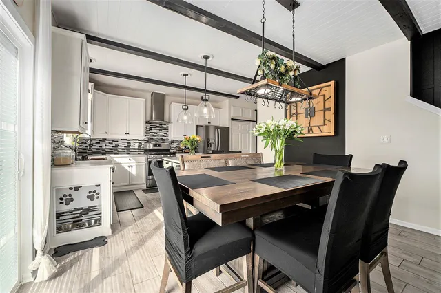 a view of a dining room with furniture