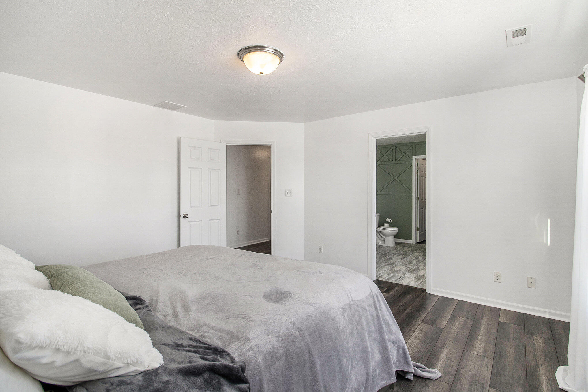 3700 Sagebrook Street Portage, IN 46368 - Photo 21 of 42 a bedroom with a bed and wooden floor