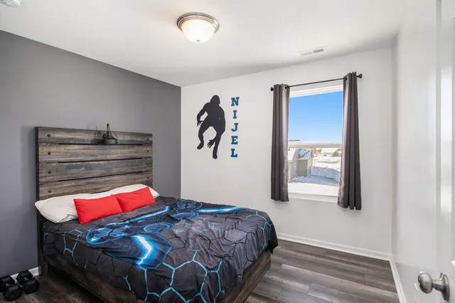 a bedroom with a bed and closet