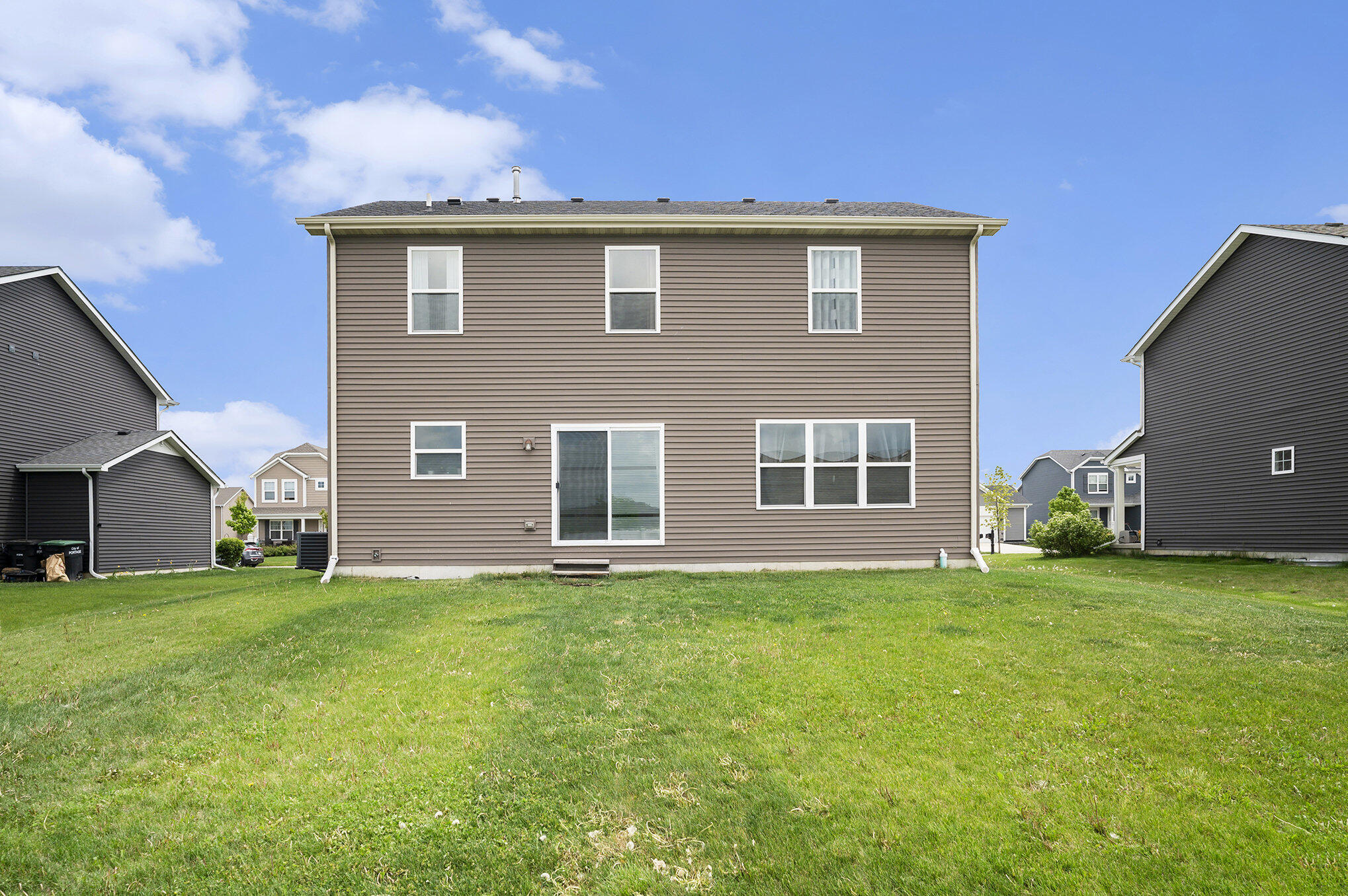3700 Sagebrook Street Portage, IN 46368 - Photo 35 of 42 a front view of a house with a yard