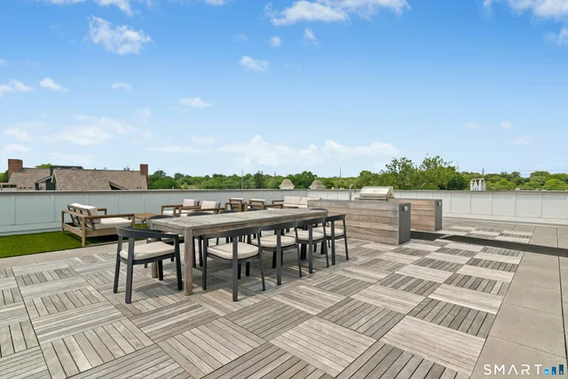 a view of a terrace with chairs