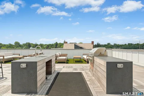 a view of a terrace with a lake view