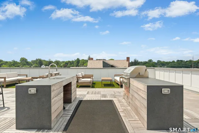 a view of a terrace with a lake view