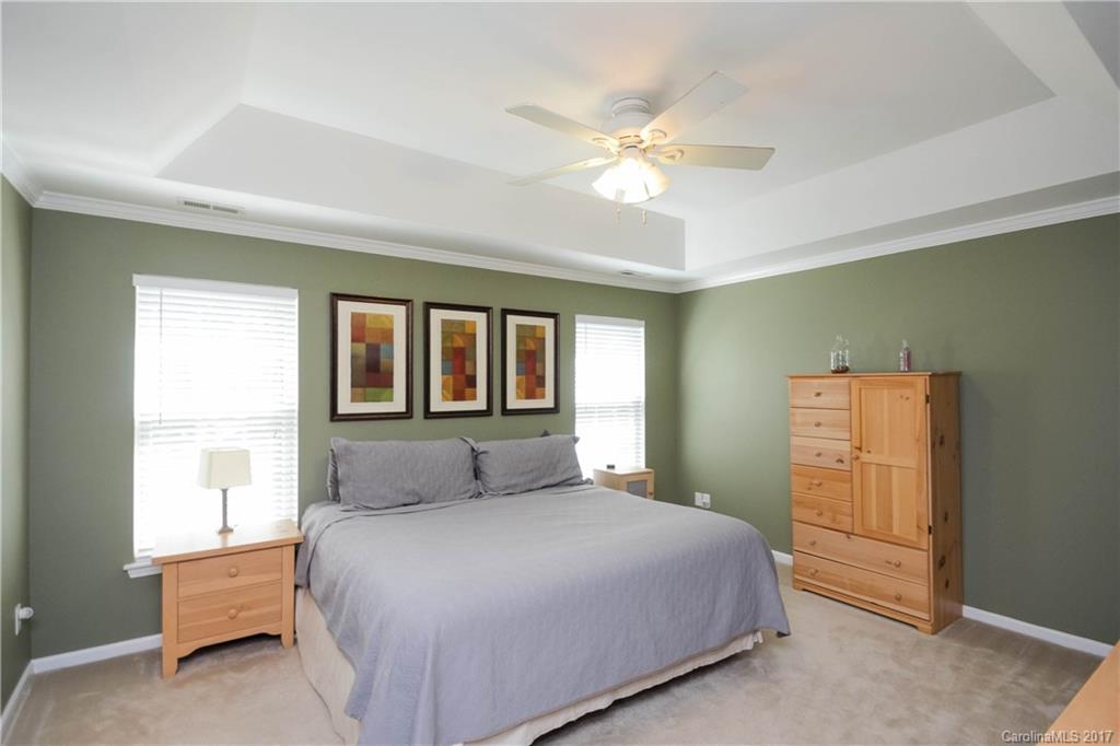 432 St George Road Fort Mill, SC 29708 - Photo 14 of 23 a bedroom with a bed and a window