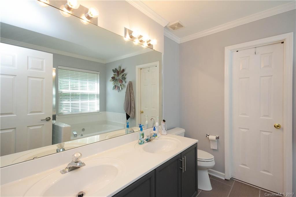 432 St George Road Fort Mill, SC 29708 - Photo 15 of 23 a bathroom with a sink a toilet and shower