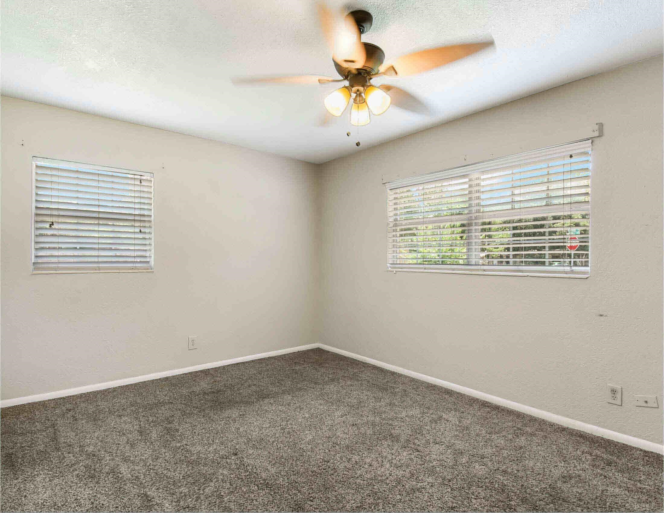 10403 Ebbitt Road Jacksonville, FL 32246 - Photo 11 of 22 an empty room with a window
