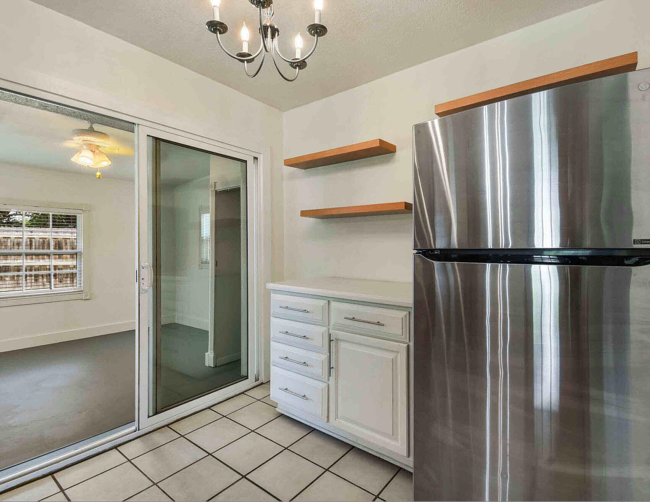10403 Ebbitt Road Jacksonville, FL 32246 - Photo 19 of 22 a view of a hallway with closet and chandelier
