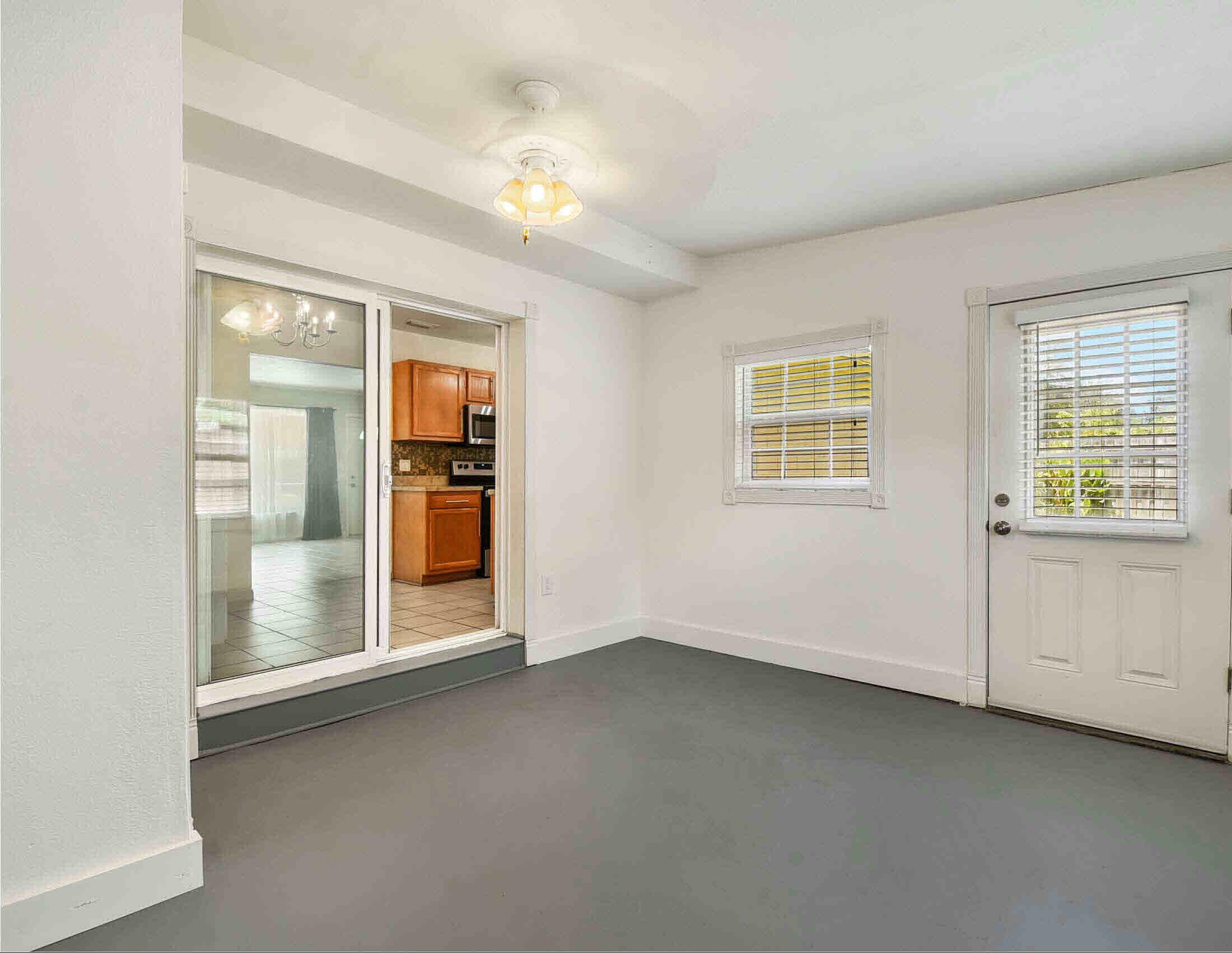 10403 Ebbitt Road Jacksonville, FL 32246 - Photo 21 of 22 an empty room with windows