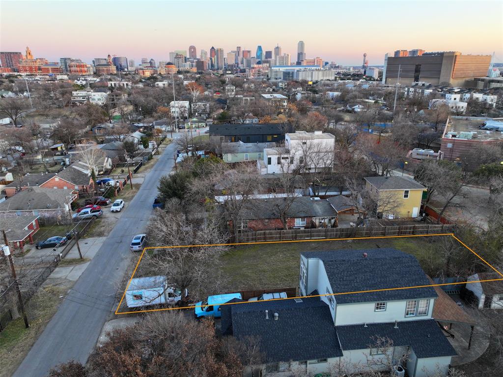 an aerial view of a city with lots of residential buildings